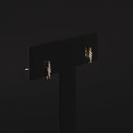 Load and play video in Gallery viewer, Omnia Bolt Diamond Earrings